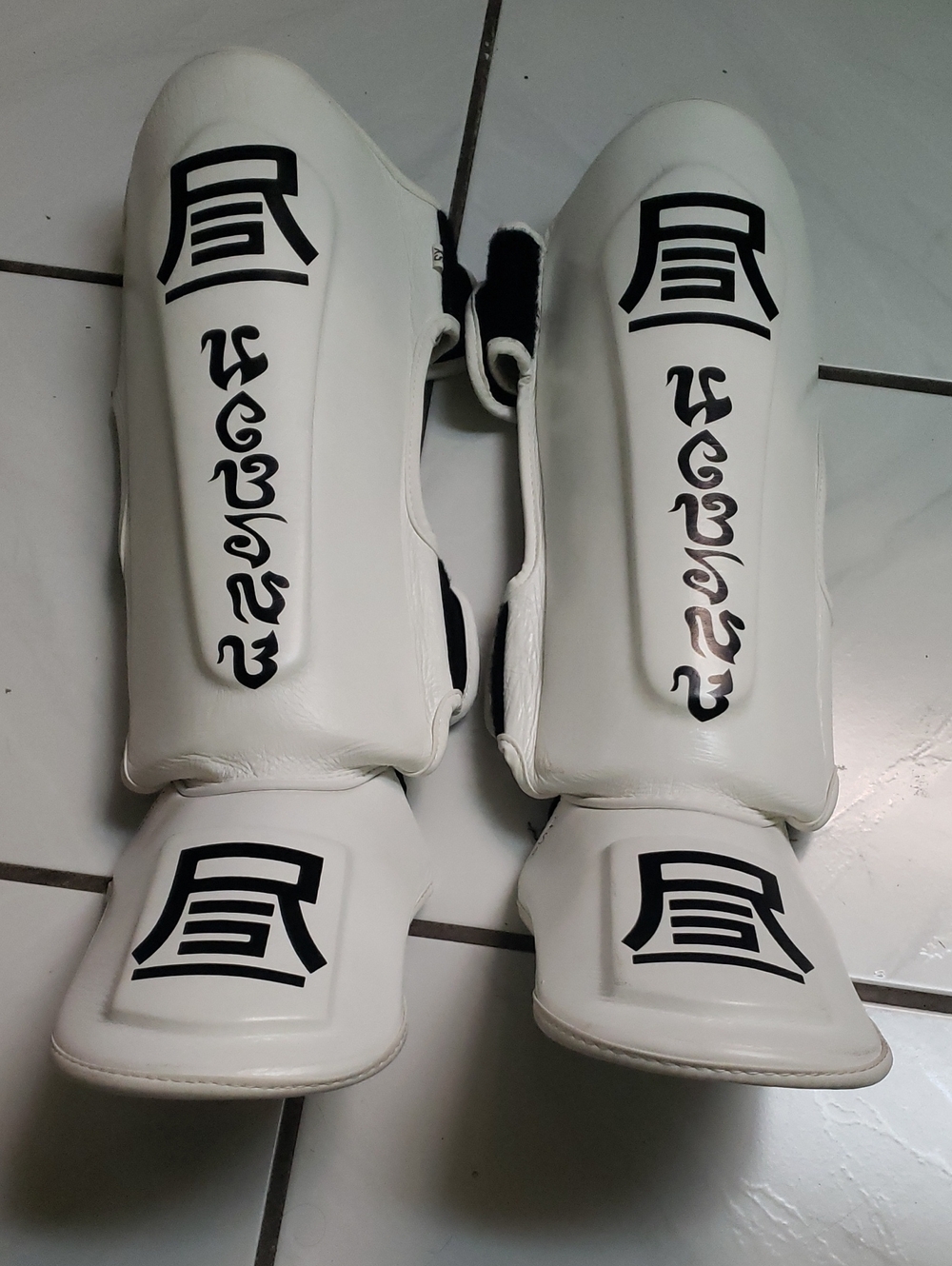 Like new white Martial Arts Shin Guards with Black Graphic